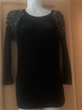 Mesh sweater with silver and black studs on shoulders, M